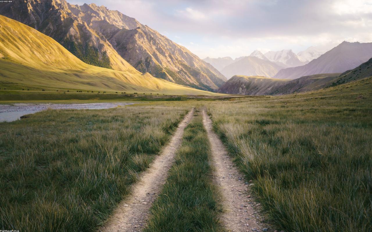 A person walking toward sunrise with a sense of direction and purpose